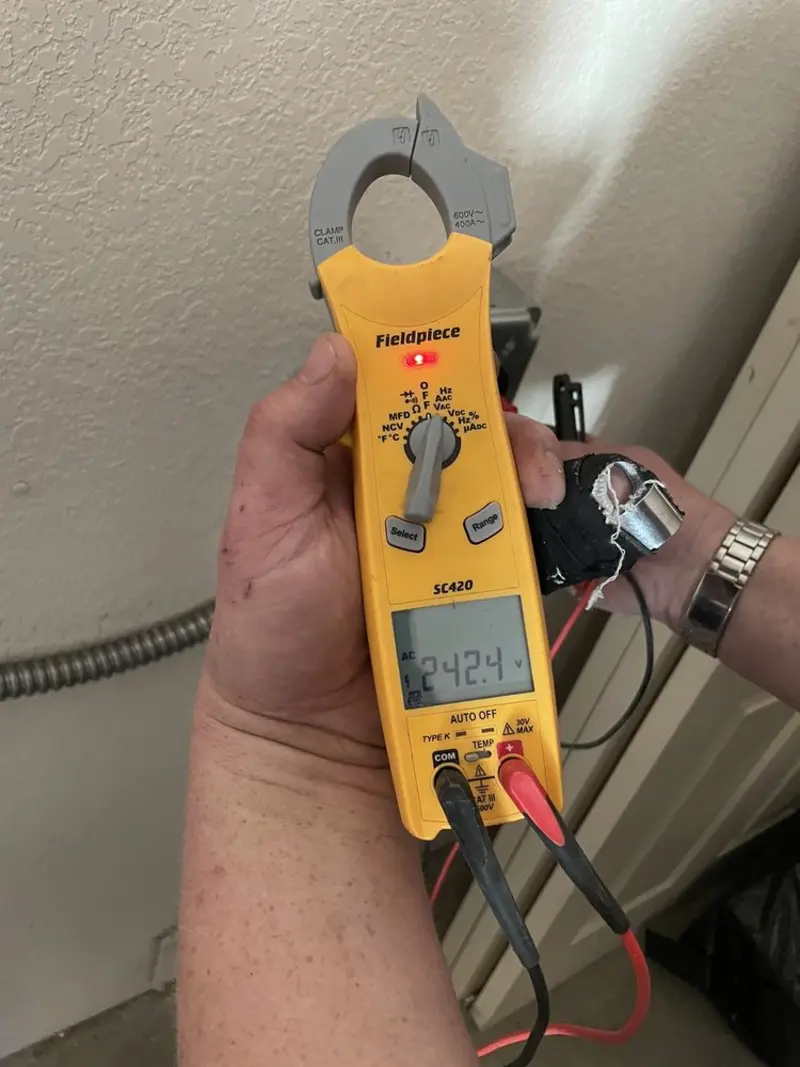 Voltage testing with clamp meter during Circuit Breaker Repair in Withamsville